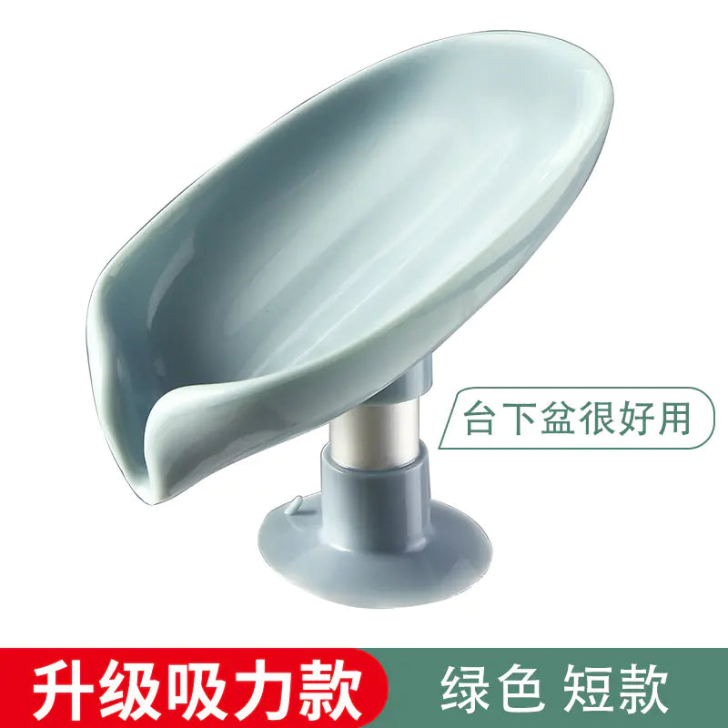 Gray leaf shaped soap holder with suction base for bathroom use