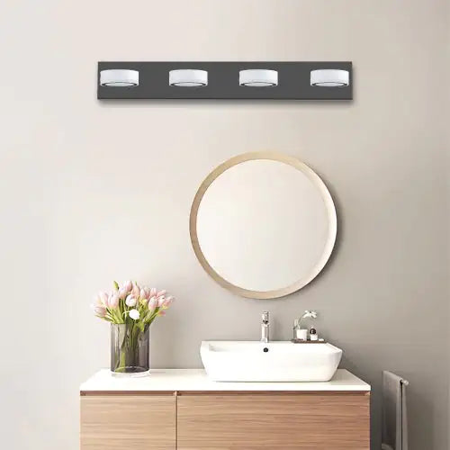 Modern LED bathroom wall light 4 bulbs mounted above circular mirror in stylish bathroom