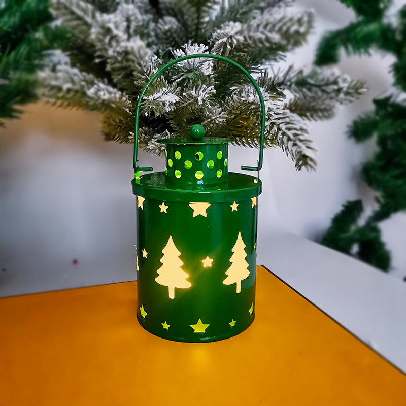 Shopi Vella green LED Christmas candle lanterns with tree and star cutouts for festive home storage decor