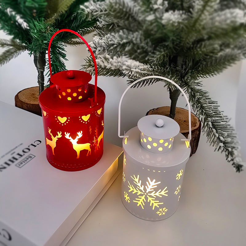 Shopi Vella LED Christmas candle lanterns in red and white with festive reindeer and snowflake designs