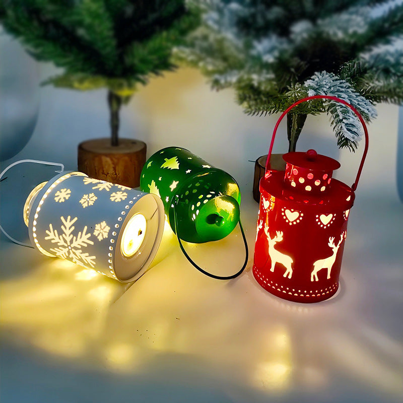 Shopi Vella LED Christmas candle lanterns in red, green, and white with festive holiday designs