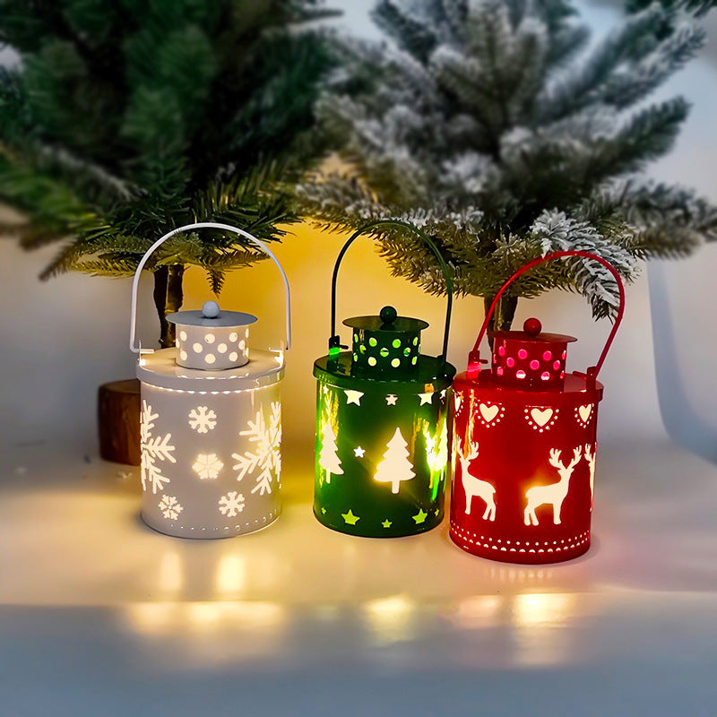Shopi Vella LED Christmas candle lanterns in white, green, and red with festive holiday cutout designs