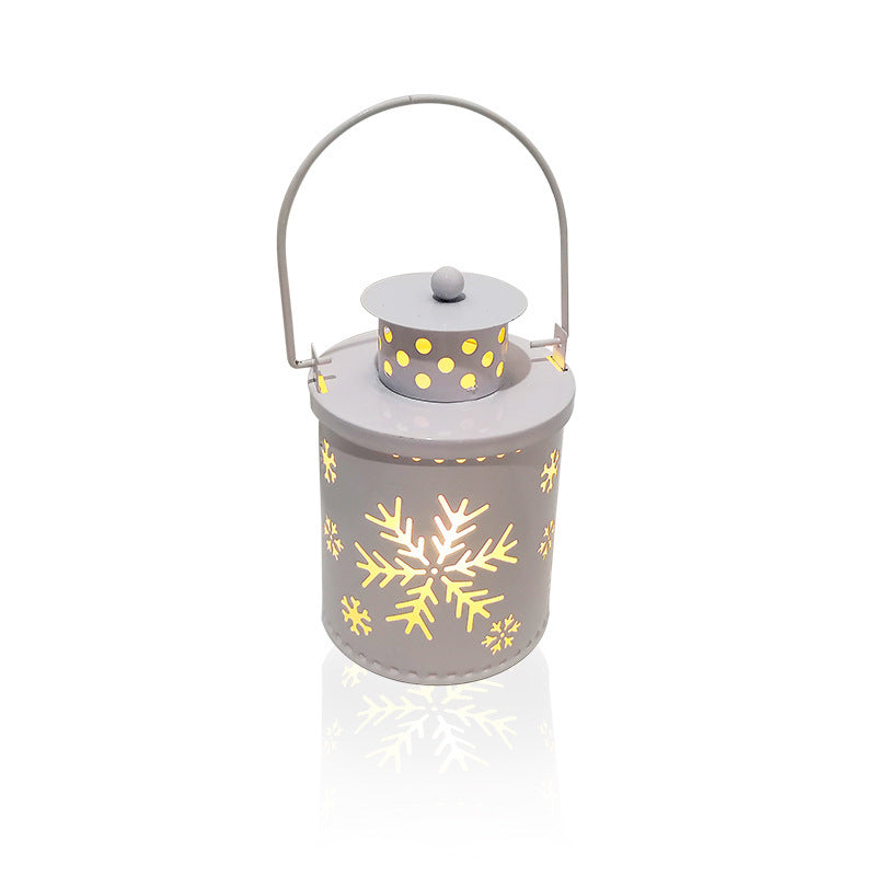 Shopi Vella LED Christmas candle lanterns with snowflake cutouts emitting warm light for holiday decor