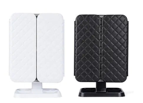 White and black LED makeup mirror with lights featuring foldable panels and a sturdy base