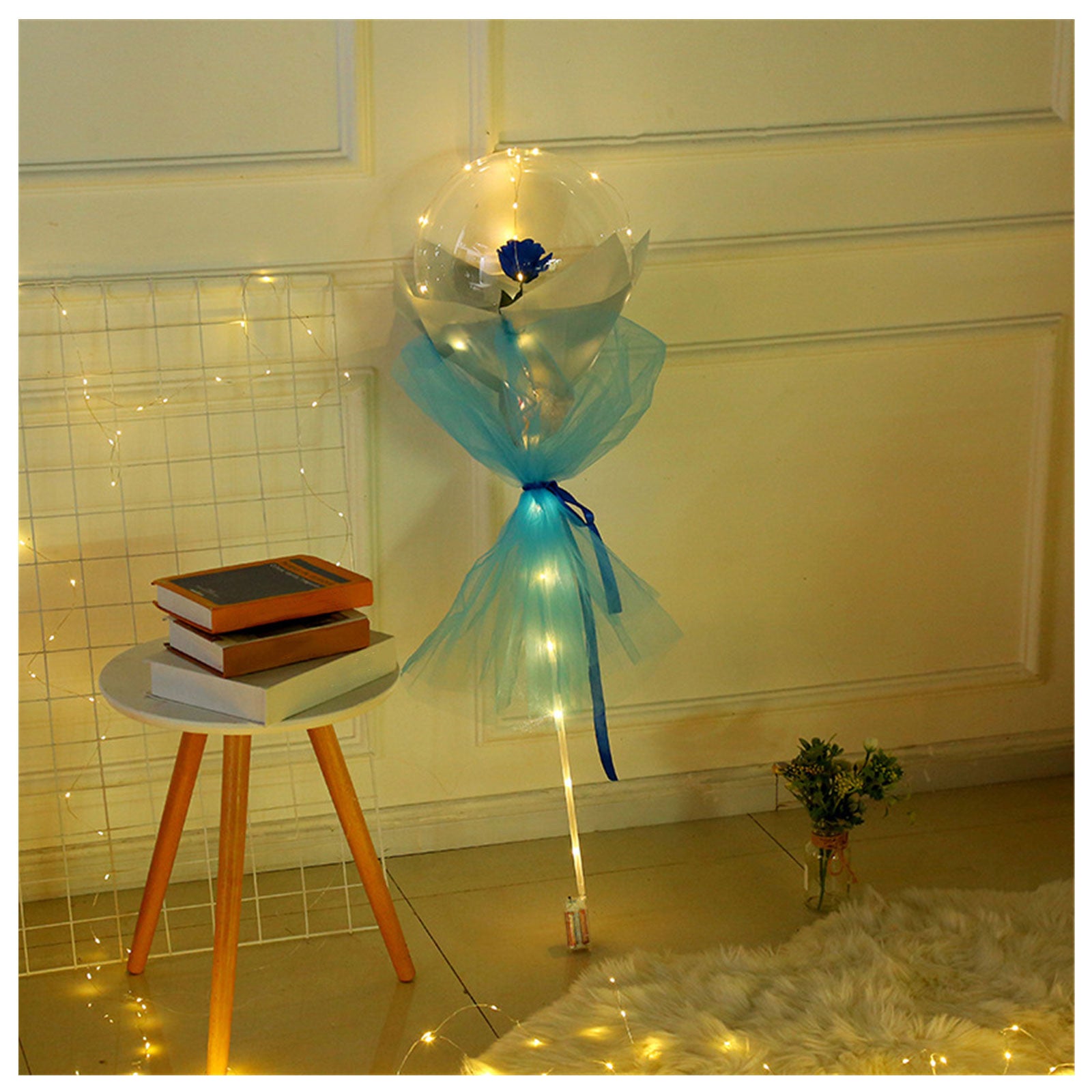 Shopi Vella LED rose balloon bouquet with blue rose and decorative lights in cozy room setting