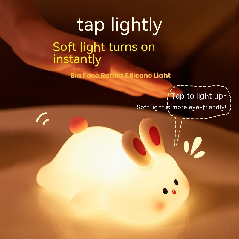 Shopi Vella LED touch sensor bedside lamp shaped like a glowing soft silicone rabbit for gentle lighting
