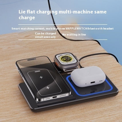 LED wireless charger stand for Airpods with phone and smartwatch charging on a wooden desk