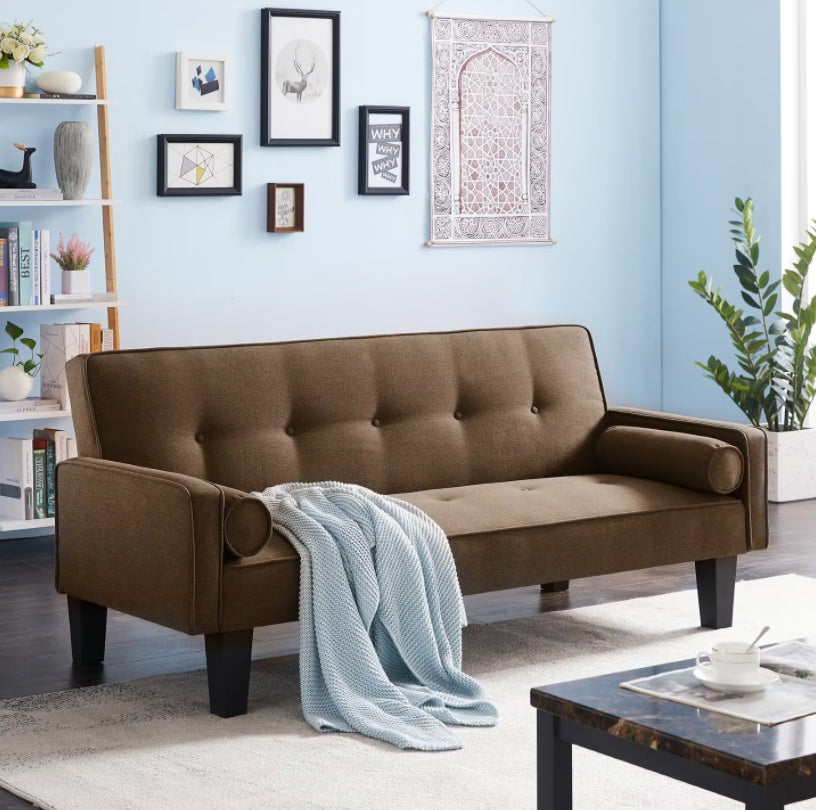 Shopi Vella brown living room sofa with pillows and a light blue throw blanket in modern decor