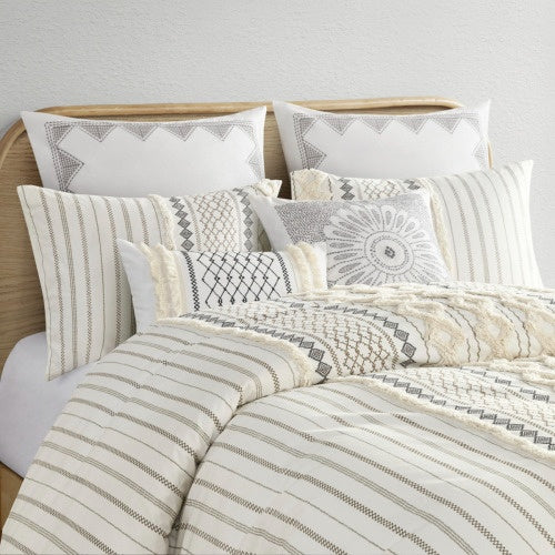 Shopi Vella luxury cotton duvet set with chenille in neutral tones featuring textured patterns and multiple pillows