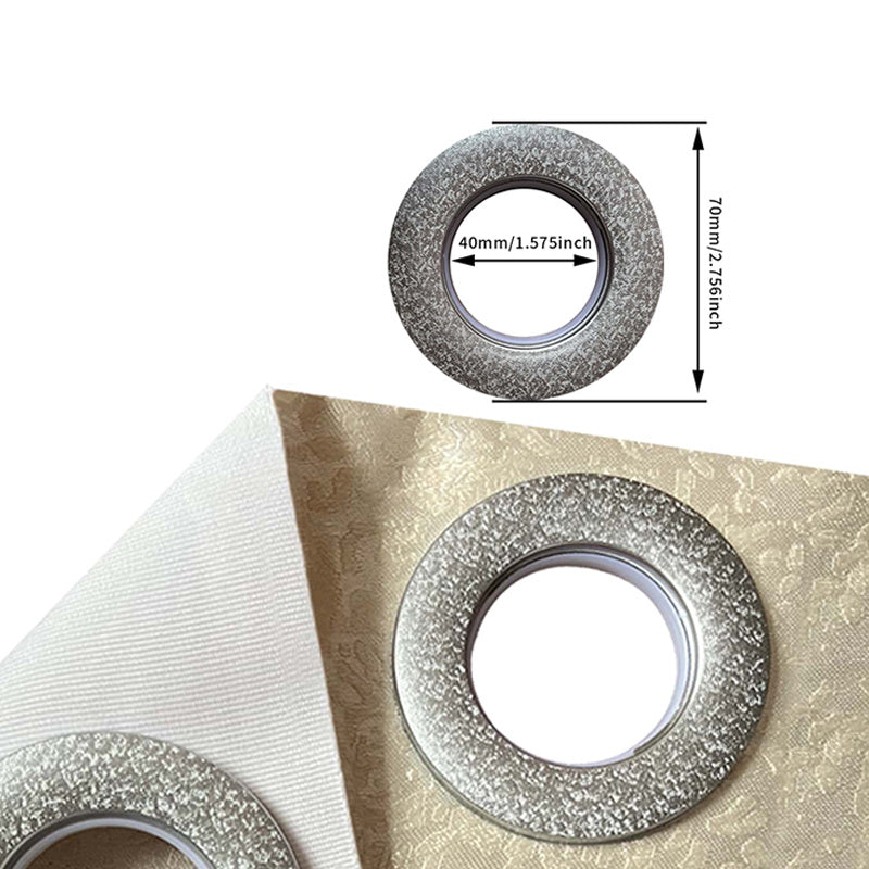 Close-up of metal grommet rings on luxury embroidered bedroom curtains by Shopi Vella with measurements