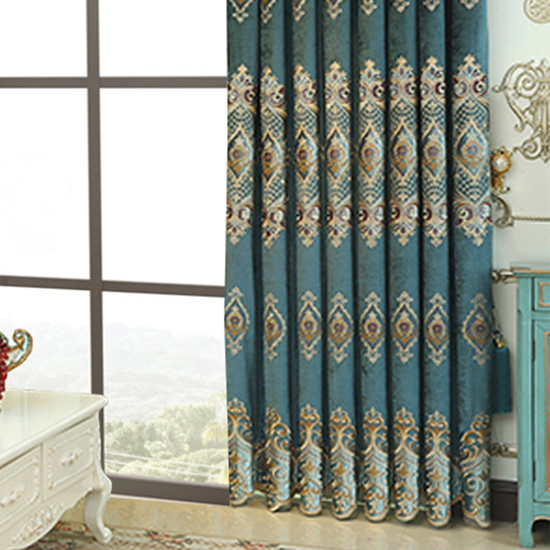 Shopi Vella luxury embroidered velvet curtains in blue with intricate gold and beige patterns