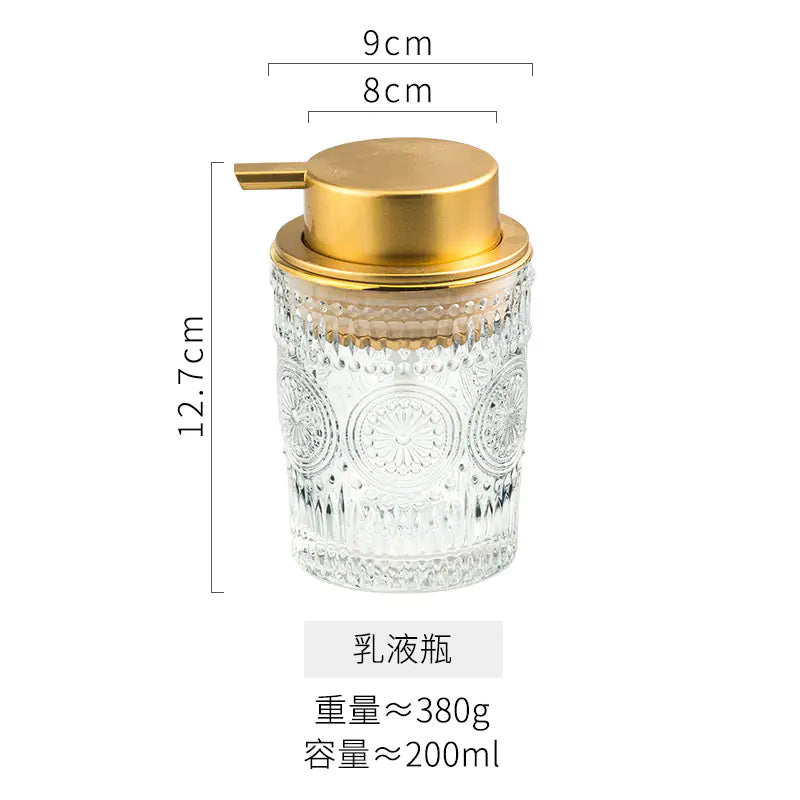 Luxury glass soap dispenser with gold pump and textured clear glass body 12.7 cm tall