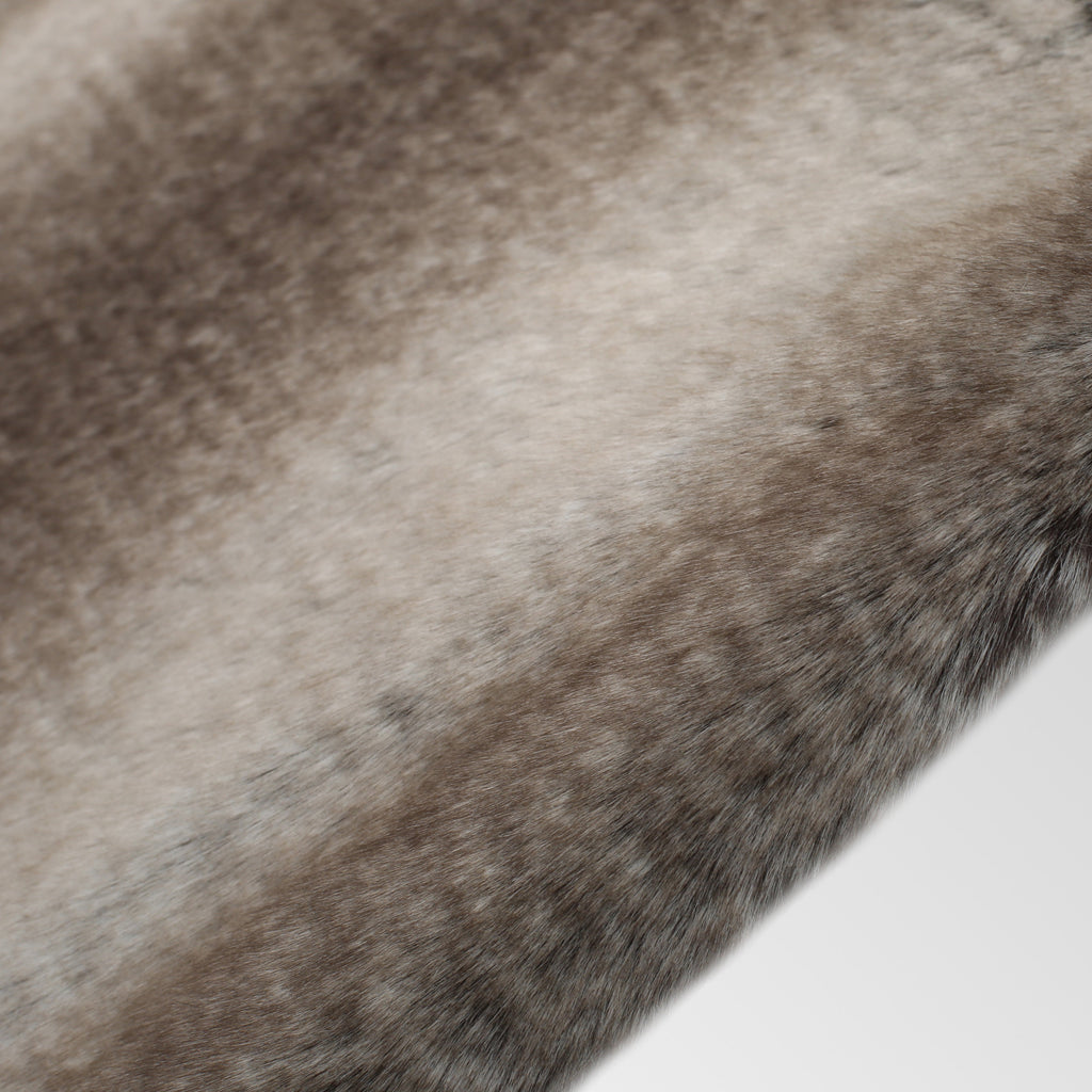 Close-up of Shopi Vella soft fur texture luxury living room blanket in neutral brown tones