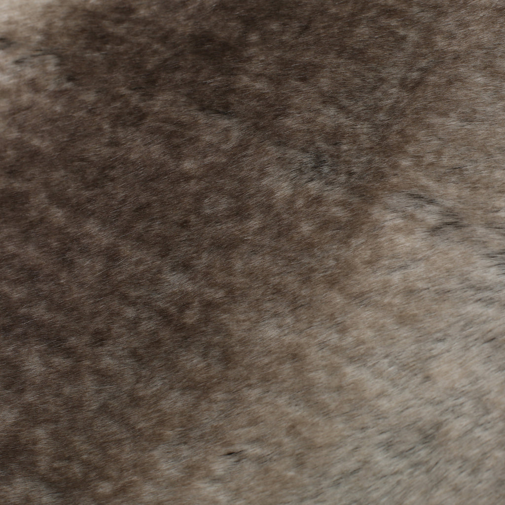 Close-up texture of Shopi Vella luxury living room blanket with soft brown and gray fur-like surface