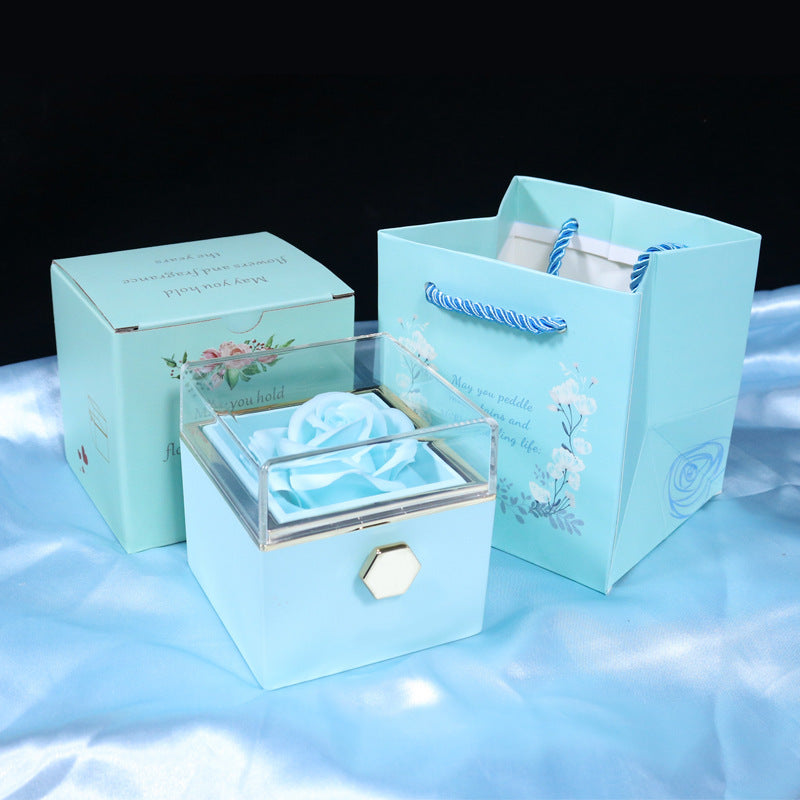 Blue soap flower jewelry packaging set with a transparent lid box and matching gift bag for home storage