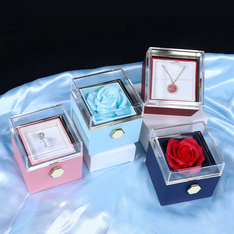 Colorful home storage boxes with clear lids featuring soap flower jewelry packaging for rings and necklaces