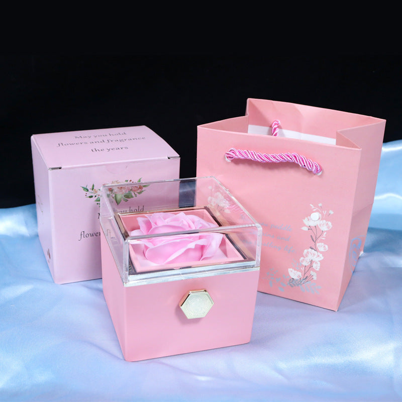 Pink soap flower jewelry packaging box with clear lid and matching gift bag for elegant home storage