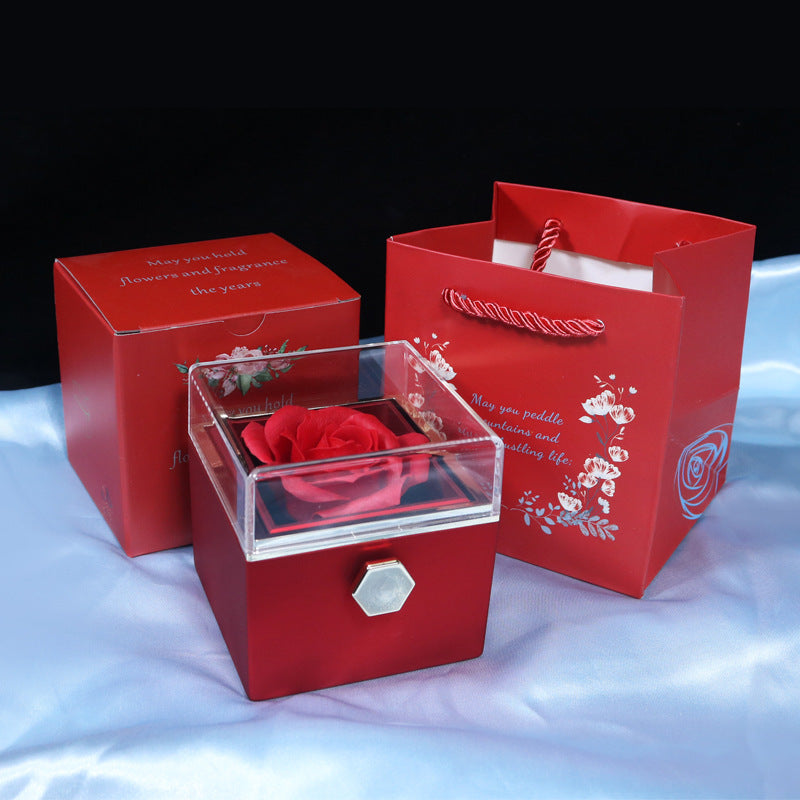 Red soap flower jewelry packaging box with clear lid and matching red gift bag for elegant home storage