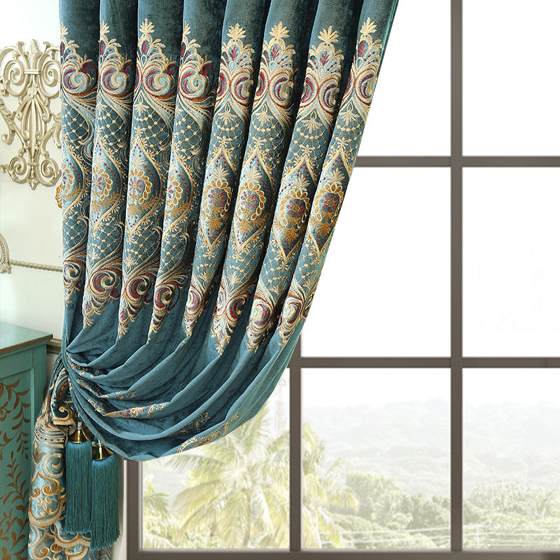 Shopi Vella luxury velvet blackout curtains in teal with intricate gold and red embroidery and decorative tassels