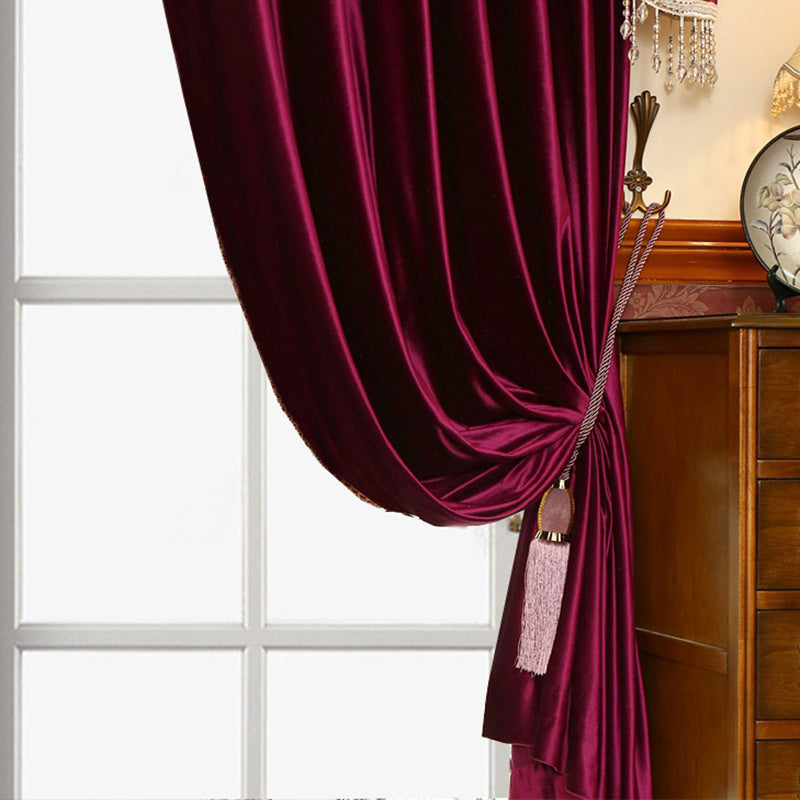Shopi Vella luxury velvet blackout curtains in deep burgundy with decorative tassel tieback