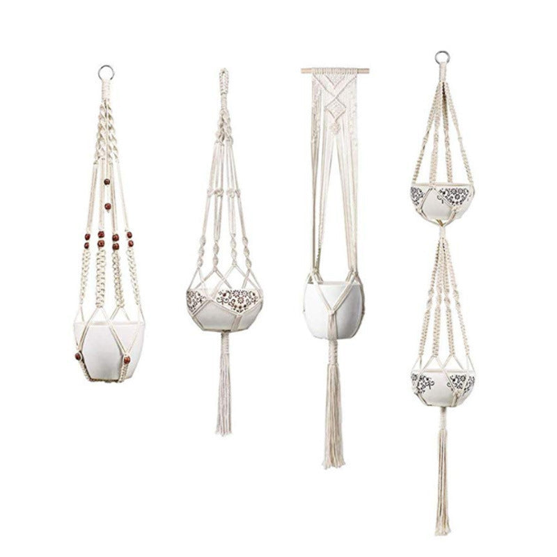 Set of four macrame hanging plant holders for home with decorative pots and intricate knot designs