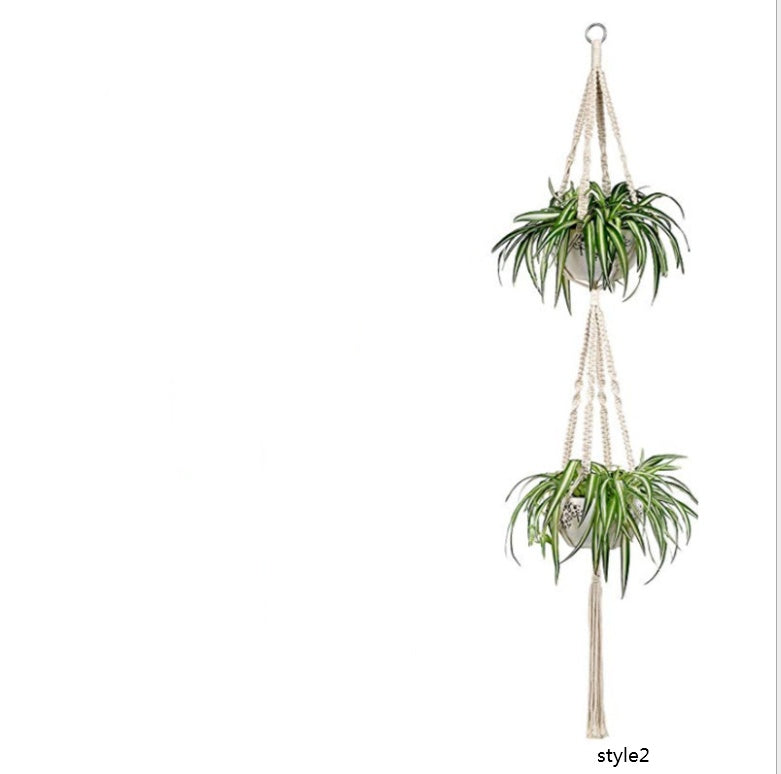 Shopi Vella macrame hanging plant holders for home with two green potted plants in white pots