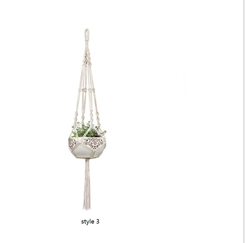 Shopi Vella macrame hanging plant holders for home featuring a white boho-style knotted design with a decorative planter