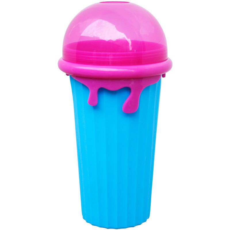 Shopi Vella magic slushy maker cup in blue with a pink dome lid for kitchen storage