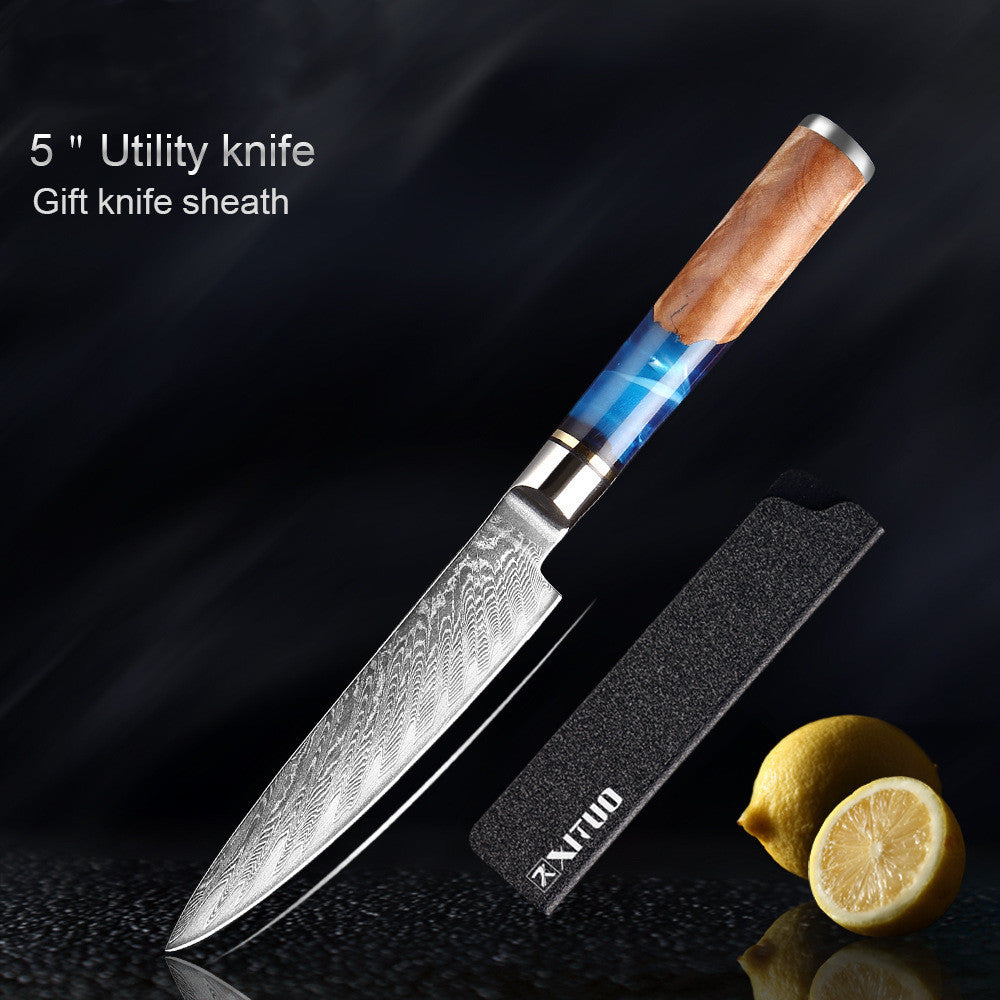 Shopi Vella 5 inch utility meat chopping knife set with wooden handle and gift knife sheath next to lemon