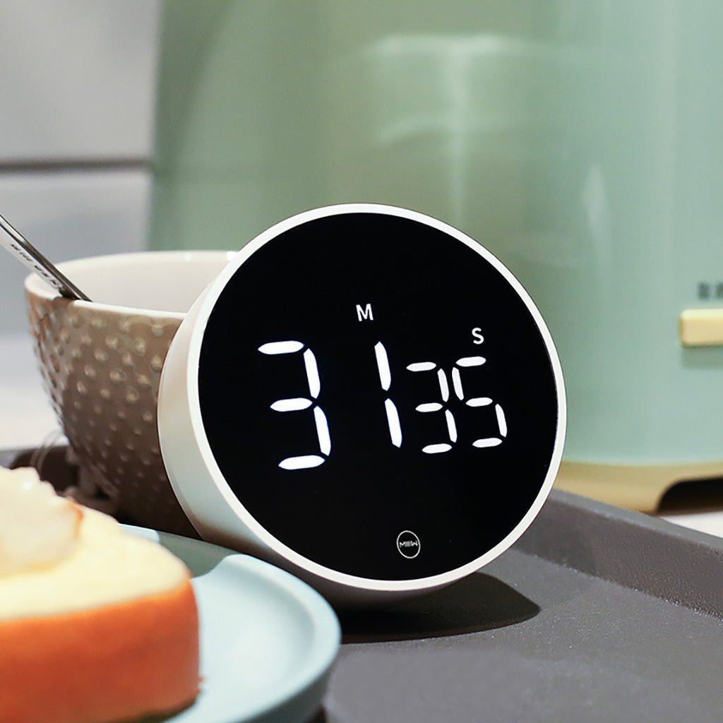 Shopi Vella magnetic timer for cooking with digital display on kitchen counter near food