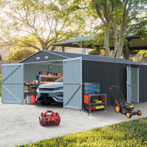 Large outdoor storage shed by Shopi Vella with open double doors showing organized tools and parked car