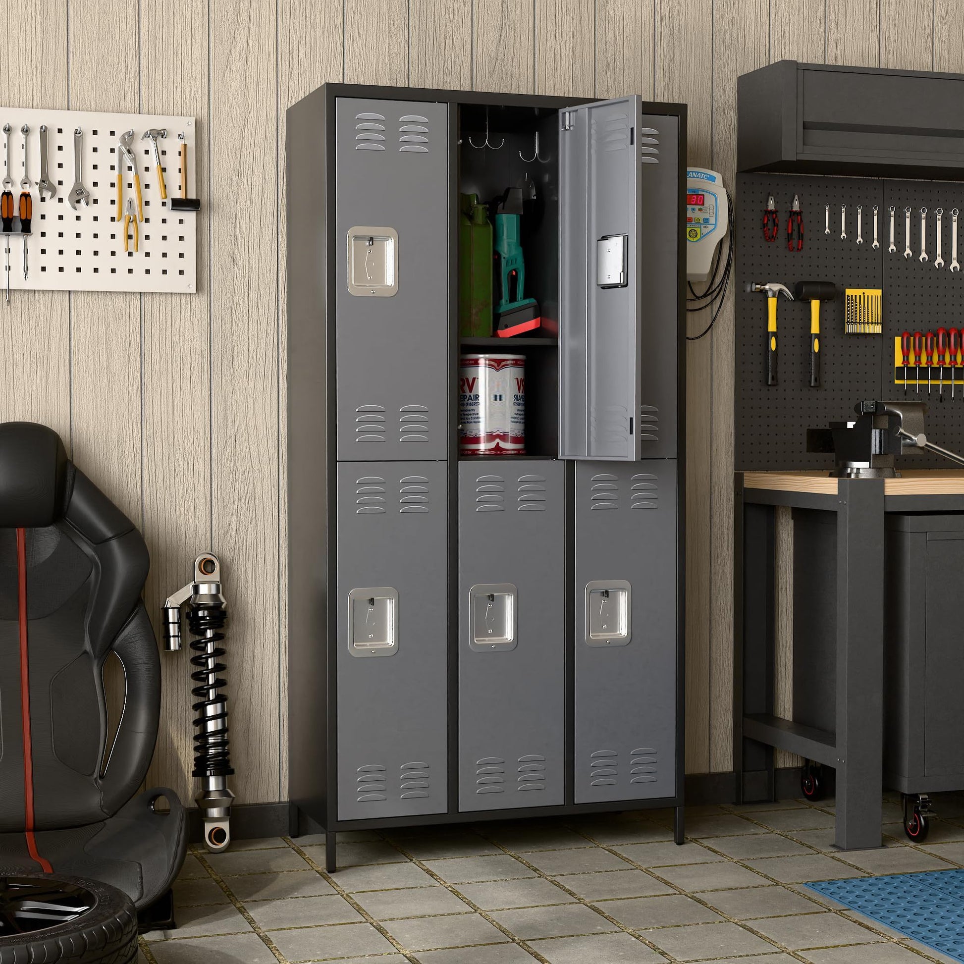 Gray metal lockers for employees with multiple compartments in a garage storage area by Shopi Vella