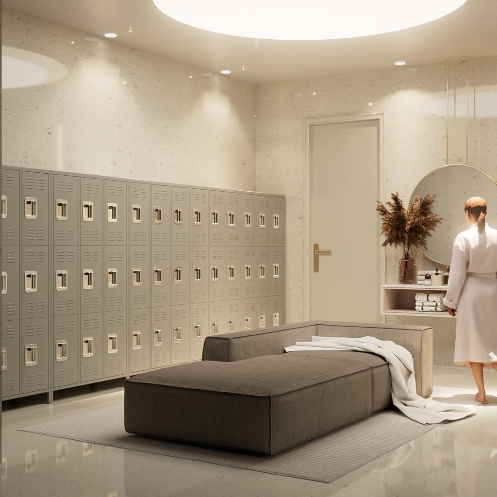 Shopi Vella metal lockers for employees in a modern changing room with seating and decorative mirror