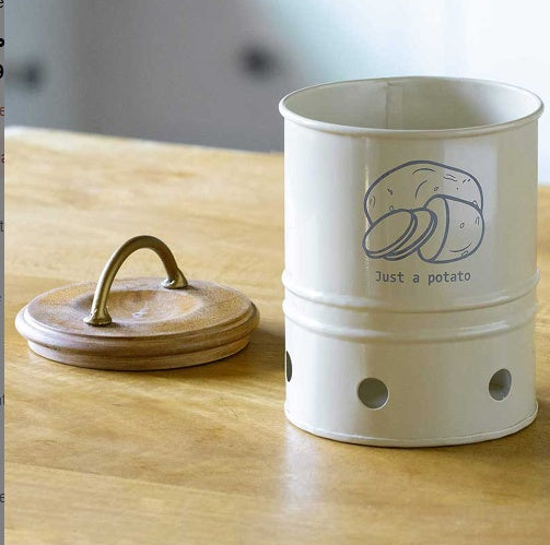Shopi Vella metal potato storage bin in white with wooden lid and ventilation holes for kitchen use