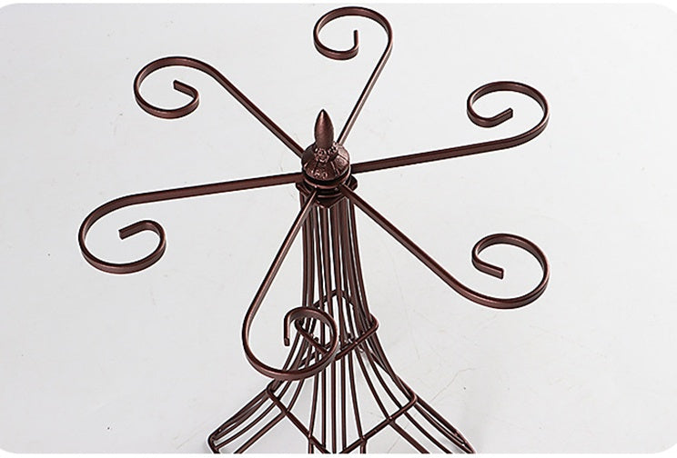 Metal wine glass holder rack with six curled hooks for hanging glasses