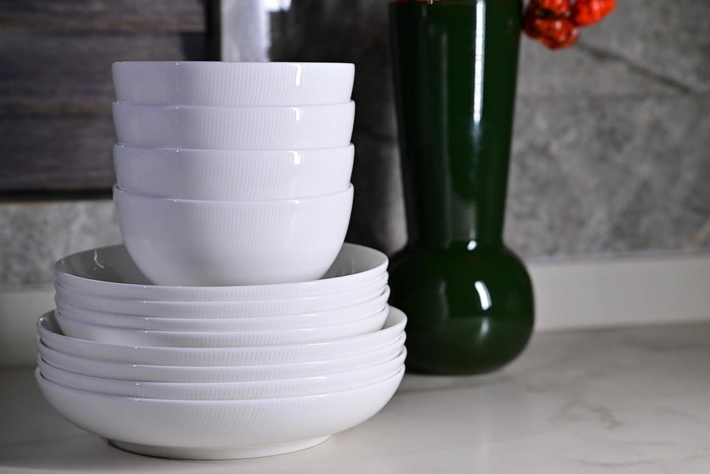 Shopi Vella white microwave and dishwasher safe dinnerware set stacked on countertop with modern decor