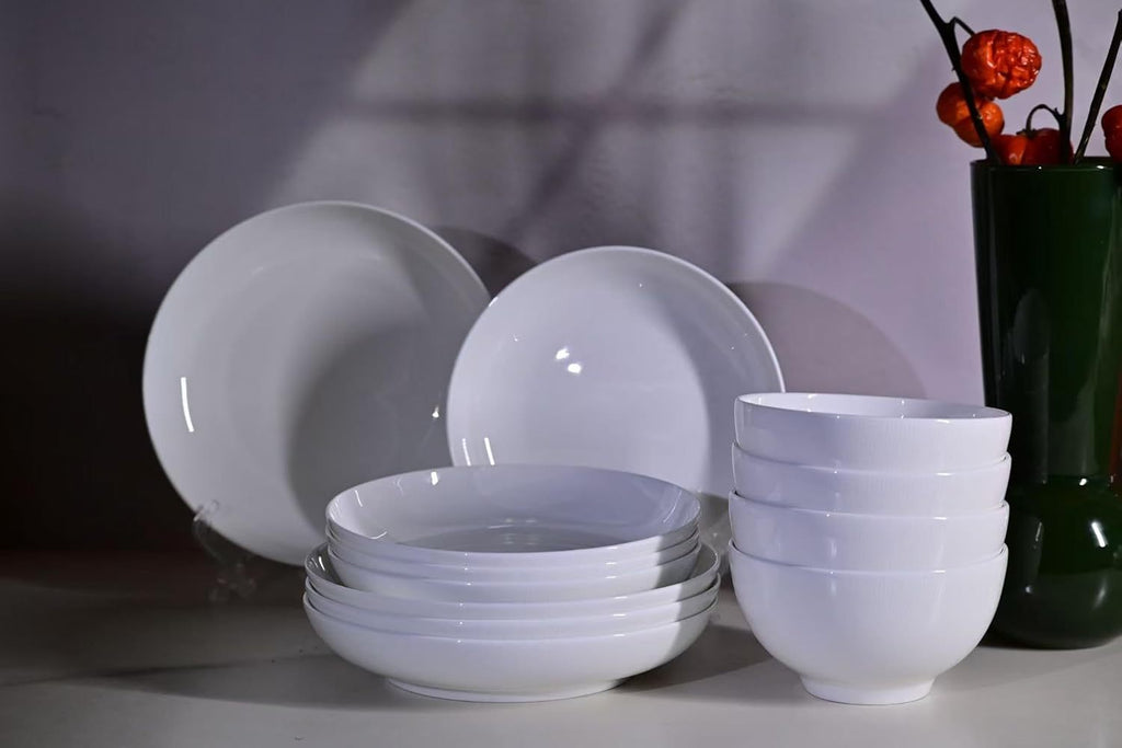Shopi Vella white microwave and dishwasher safe dinnerware set including plates and bowls displayed on table