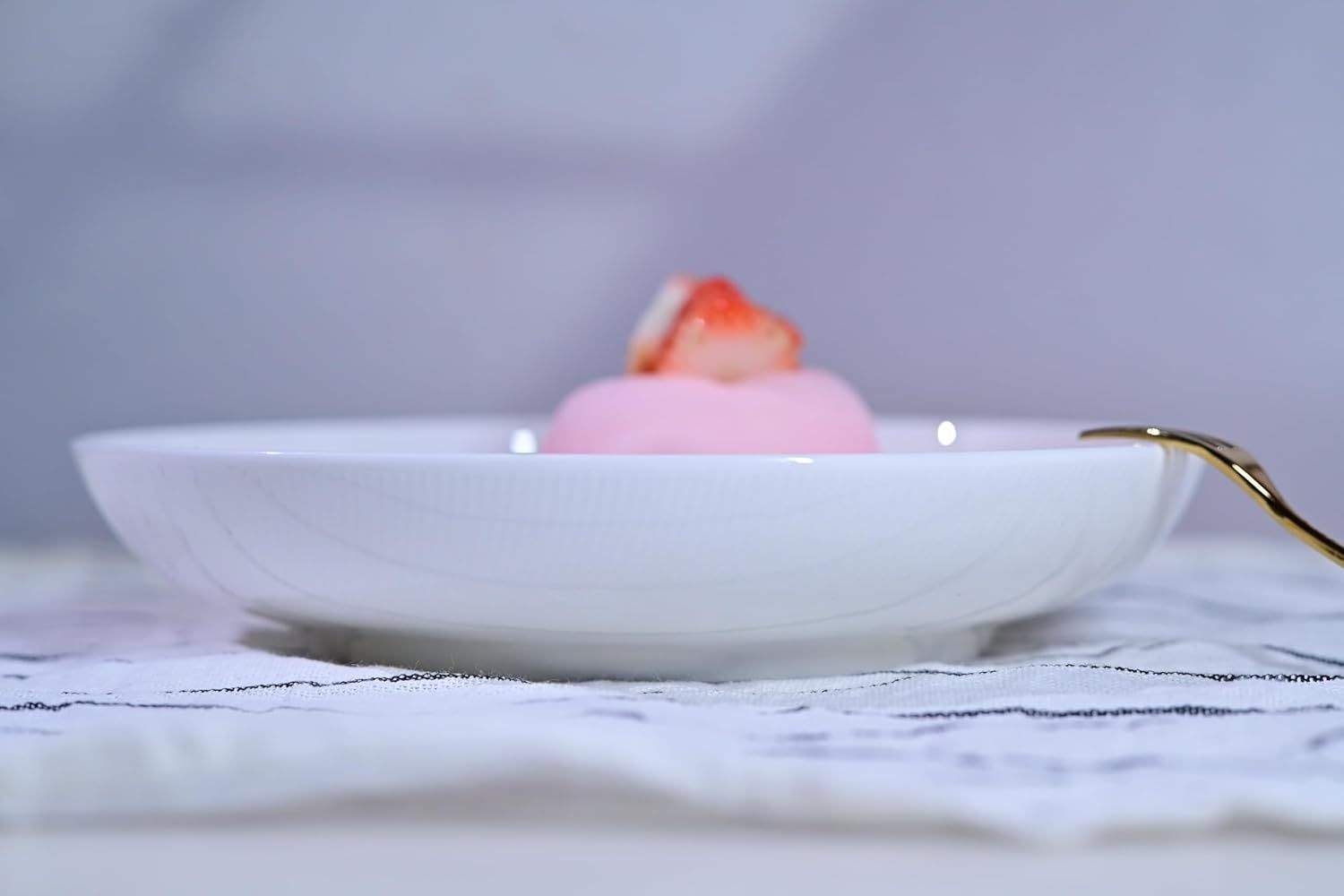 White Shopi Vella dinnerware plate with dessert showcasing microwave and dishwasher safe dinnerware