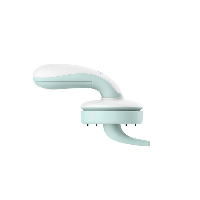 Shopi Vella mini desktop vacuum cleaner in white and mint green for small debris cleaning