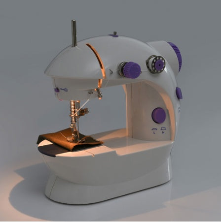 Shopi Vella mini household sewing machine in white with purple accents stitching fabric
