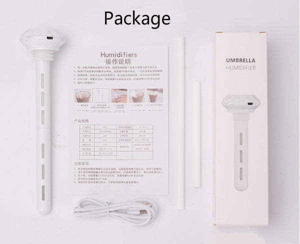 Shopi Vella mini USB humidifier with USB cable, instruction manual, and packaging for home storage