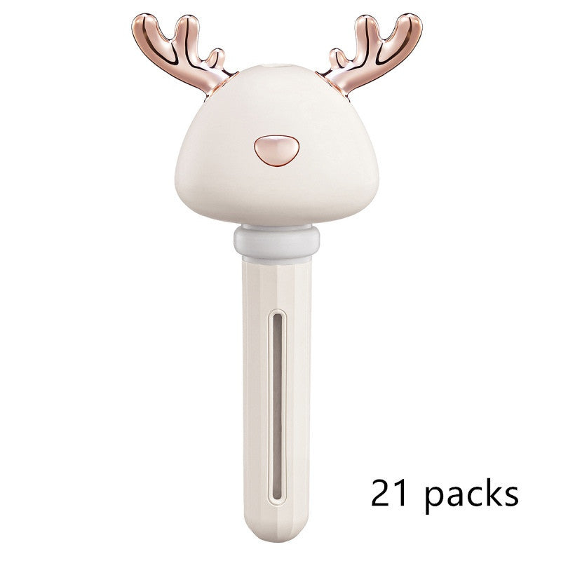 Shopi Vella mini USB humidifier with reindeer design in white and rose gold for home storage