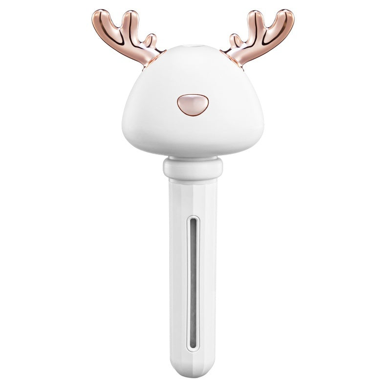 Shopi Vella mini USB humidifier with white body and rose gold deer antler design for home storage