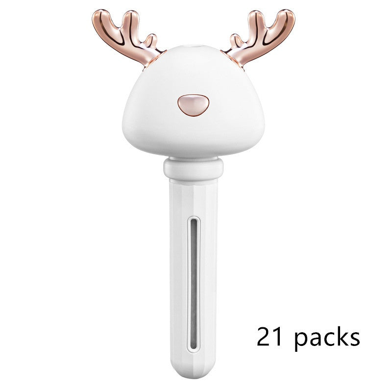 Shopi Vella mini USB humidifier shaped like a reindeer with rose gold antlers and white body