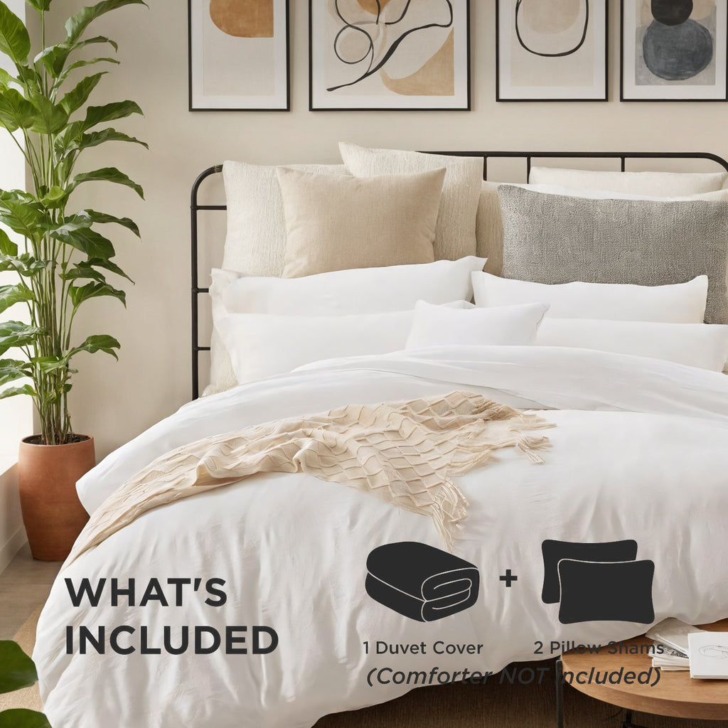 Shopi Vella modern bedroom quilted bedding set with white duvet cover and multiple pillows on black metal bed frame