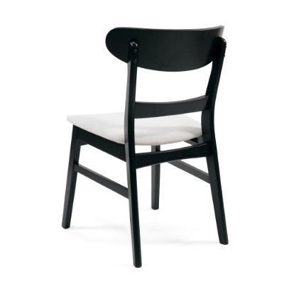 Black and white modern dining chair set with cushioned seat and curved backrest