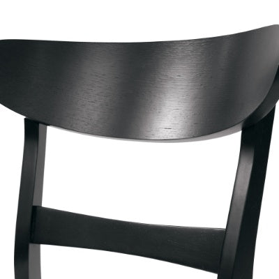 Close-up of black wooden modern dining chair set backrest with smooth curved design