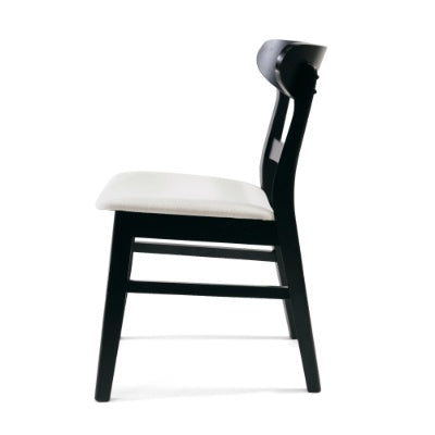 Side view of modern dining chair set with black wooden frame and white cushioned seat