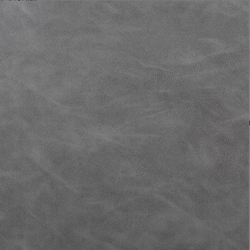 Close-up texture detail of modern gray dining set upholstery by Shopi Vella