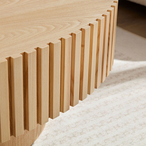 Close-up of Shopi Vella modern handmade drum coffee table with detailed wooden slat design